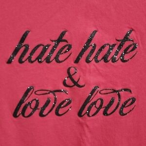 Women's Red T-shirt with Glittery Typography Design that reads "hate & love"